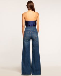 Liv Wide Leg Jean in medium wash | Ramy Brook Dark Wash Cropped Pants With Five Pockets, Dark Wash Cropped Bottoms With Five Pockets, Chic Cropped Denim Blue Jeans, Chic Fitted Denim Bottoms, Elegant Medium Wash Denim Bottoms, Chic Fitted Denim Blue Pants, High Waist Fitted Flare Jeans With Five Pockets, Chic Full-length Denim Blue Jeans, Fitted High Waist Flare Jeans With Five Pockets