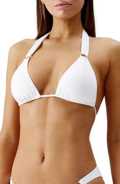 This classic bikini top is beach ready with adjustable ties and ring hardware that gleams in the sunlight. Ties at neck and back Lined, with removable soft cups 91% polyamide, 9% elastane Hand wash, dry flat Imported Elegant Adjustable Swimwear, Elegant White Halter Top For The Beach, Elegant Adjustable Swimwear For Poolside, White Adjustable Triangle Halter Top, Elegant Adjustable Swimwear For Pool, Adjustable Padded Halter Top For Beach, Melissa Odabash, Beach Ready, Soft Cup