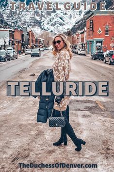 a woman standing in the middle of a road with her hand on her hip, and text overlay that reads travel guide telluride