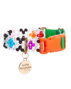 a bracelet with beads and charms on it