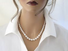 This simple Swarovski pearl necklace features graduated pearls ranging in size from 6mm up to 10mm.Measures 17 inches in length + a 2 inch extender chain.Items arrive in a beautiful hand decorated gift box.Ready to ship in 3-5 business days.To view the coordinating earrings:  https://www.etsy.com/listing/228938798/swarovski-pearl-studs-bridesmaid-gift?ref=shop_home_active_18 Elegant Beaded Necklaces 16 Inch Length, Elegant White Beaded Necklaces For Anniversary, Elegant 16 Inch Pearl Necklace Gift, 16 Inch Round Elegant Pearl Necklace, Elegant 16 Inch Round Pearl Necklace, Elegant 16-inch Pearl Necklace Gift, Elegant White 16 Inch Pearl Necklace, Single Strand Beaded Necklaces For Wedding, Elegant Beaded Necklaces With Round Beads For Anniversary