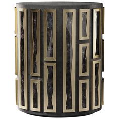 a black and gold side table with geometric designs