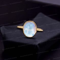 Bezel Set Moonstone Ring 14K Gold Rainbow Moonstone Ring Natural Gemstone Anniversary Gift for Her Unique Jewelry Solitaire Stacking Ring Welcome to Shreenathjewelry JUST OPENED- Experience beautiful jewelry that complements your everyday style, and completes your look. Our jewelry is so stunning, and so you are. Ring description Primary Stone:- Moonstone (Natural) Stone Shape:- Oval Stone Size:- 8x10 MM Stone Color:- Blue Fire  Jewelry Type: Stacking Ring Method: Cast Personalization: Possible Occasion: Engagement Ring Size: We make rings from US 4 to US 10. (If you need smaller or bigger ring size, please ask me to resize) Country of Manufacture: India All our work is custom made by hand with Love and Care in our workshop ♥ CUSTOM ORDERS Please let us know if you want any customization o Fire Jewelry, Rainbow Moonstone Ring, Big Rings, Engagement Ring Sizes, Blue Fire, Rings Cool, Oval Stone, Anniversary Gift For Her, Moonstone Ring