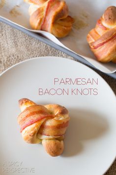 two pastries on a plate with the words parmesan bacon knot's