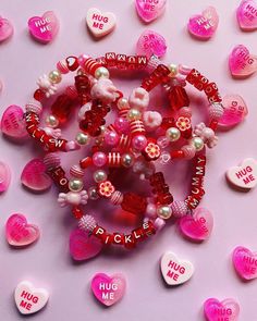 💖Fun & funky Valentine's theme bracelets 💓Each bracelet comes with a Loveheart sweets glittery Hug Me heart charm  💝Whether they're matching Mummy & Daughter, made to include your loved ones names or Galentines to show your besties how much you love them  ❤️🔥Come in Toddler (3-5years), Child (6-13years) & Adult (Age14+) sizes 💗Adult bracelets can be made in any size requested, just add a note with your order or pop me a message with your required measurement/s in CM, if not all adult size b Personalized Pink Charm Bracelet, Valentine's Day Playful Beaded Jewelry, Cute Heart Beads Charm Bracelet For Valentine's Day, Cute Heart Beaded Bracelets For Valentine's Day, Cute Heart-shaped Beaded Bracelets For Valentine's Day, Trendy Bracelets For Valentine's Day Party, Cute Heart Beads Beaded Bracelets For Valentine's Day, Pink Bracelet For Party Favors, Playful Multicolor Beaded Bracelets For Valentine's Day