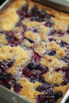 a blueberry cobbler in a metal pan