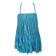 Chic vintage 1990s MISSONI turquoise, teal, and blue signature rayon knit halter top OR skirt! Features bold vibrant shades of blue that are perfect on any skin tone. Simple slips over the head. Strap can also be tucked in to be worn as a tube top or as a flirty skirt. Fully lined. Great with jeans, shorts, trousers or a skirt. In great condition. Made in Italy Approxiamtely Size Small - Medium (lots of stretch) Measurements: 30-36 inch bust Up to 36 inch waist (empire style) 90s Halter Top, Vivienne Westwood Corset, Westwood Corset, Circus Oc, Vintage Missoni, Halter Top And Skirt, 90s Skirt, Make Outfits, Teal And Brown