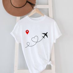 Travel Shirt, Travel Lover Gift, Heart Plane T-Shirt, Heart Vacation Shirt, Love Travel Shirt, Road Trip Shirt,Travel Agent Shirt, Hi, Thank you very much for choosing us Please check all color and size charts before place the order  How to Place an order  ↠ Please review all the information provided before placing an order ↠ Select the shirt type and size using the drop down menu. ↠ Select the color of the shirt using the following drop down menu. ↠ Please add the vinyl color (white or black) i Travel Tshirt Design Ideas, Travel Tshirt, Travel Shirt, Love Travel, Fashion Hacks, Travel Shirts, Travel Lover, Vacation Shirts, Travel Agent