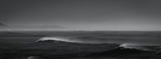 black and white photograph of waves in the ocean