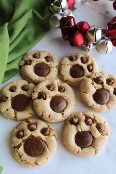 chocolate chip cookies are arranged on a table