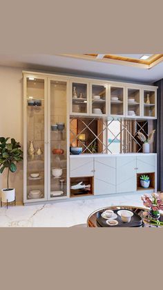 a living room filled with lots of furniture next to a wall mounted shelf covered in plates and bowls