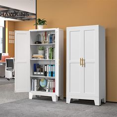 two white cabinets in an office setting with bookshelves and desks behind them