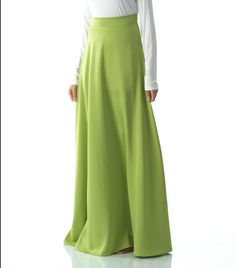 Experience effortless elegance with this luxurious satin maxi skirt, perfect for a variety of formal occasions. Its high waist design and invisible zipper provide a flattering silhouette, while the lack of lining adds a touch of daring. For the best fit, size up if you are in between sizes. At 42 inches long, this skirt exudes sophistication and grace. Hand wash for lasting perfection.