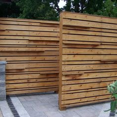 two wooden fences are next to each other