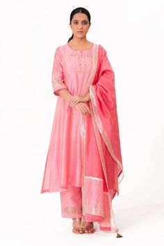 Lotus pink A-line kurta with embroidery along the neckline and sleeves. Paired with a pant and tissue applique work dupatta. - Aza Fashions Bollywood Style Festive Palazzo Set With Embroidered Neckline, Bollywood Style Anarkali Set With Embroidered Neckline For Eid, Festive Straight Kurta Anarkali Set With Embroidered Neckline, Elegant Salwar Kameez With Embroidered Neckline, Festive Anarkali Set With Embroidered Neckline And Straight Kurta, Navratri Chanderi Sets With Embroidered Neckline, Bollywood Style Embroidered Salwar Kameez For Wedding, Bollywood Style Embroidered Wedding Salwar Kameez, Bollywood Wedding Salwar Kameez With Embroidered Neckline