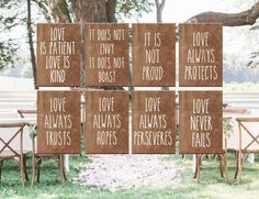 wooden signs that say love, love alwayss, love trusts and love not protects