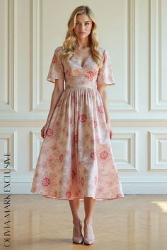 Olivia Mark - Elegant Blush Floral Midi Dress with V-neckline and Flutter Sleeves Gentle Movement, Understated Luxury, Floral Midi Dress, Floral Motifs, Flutter Sleeves, Cinched Waist, Olivia Mark, Full Skirt, Flutter Sleeve