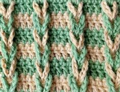 the crochet pattern is green and beige