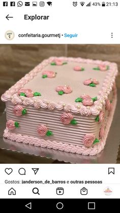 a cake with pink frosting and roses on it is being viewed on instagram