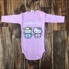 Brand New With Tags Hello Kitty Onesie Long Sleeve Snaps At Bottom Hello Kitty And Fifi Graphic On Front Sizes Available: 0-3 Months, 3-6 Months Color: Pink Organic Cotton Makes A Super Cute Baby Shower Or Holiday Gift! Check My Closet For Other Hello Kitty Characters! Hello Kitty Onesie, Hello Kitty Baby, Kitty Baby, Hello Kitty Characters, Hello Kitty Pink, Pink Hello Kitty, Pink Baby Girl, Pink Bodysuit, Striped Bodysuit