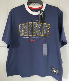 NIKE womens the nike tee loose fit Crop t shirt navy blue medium NWT. Navy Sporty T-shirt For Streetwear, Nike Blue Sportswear T-shirt, Nike Sports T-shirt In Navy, Nike Navy Sports T-shirt, Nike Navy T-shirt For Sports, Sporty Navy T-shirt With Logo Print, Nike Jersey Design, Sporty Navy T-shirt For Streetwear, Nike Navy T-shirt With Graphic Print