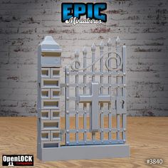 an image of a metal gate with the words epic miniatures on it and a brick wall behind it