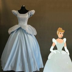 two dresses are shown on display in front of a mannequin's head