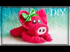 a red stuffed animal with a green bow on it's head and the words diy written above it