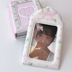 This coquette card holder is the perfect accessory for carrying your favorite photo. Hook it onto your bag or display it on your desk! PLEASE NOTE: Each order comes with one card holder and one ball chain only and does not come with any of the photocards or accessories shown in the photos - Some dust and other particles may be present due to the manufacturing process, but it can easily be wiped away - The card holder may contain some wrinkles/small indents - The characteristics stated above do not result in a defective product, so a refund/exchange will not be accepted due to this! Details: - 7.5 x 14 cm - Fits a standard sized photocard (55x85 mm) - Comes with 1 white ball chain - Made from PVC Connect with us! Instagram, TikTok, Twitter: @mins_studios  Our official website: https://minss Coquette Card, Photocard Holder Keychain, Kpop Photocard Holder, Kpop Keychain, Accessories Korean, Keychain Kawaii, Photocard Holder, Korean Photo, Kpop Photocard