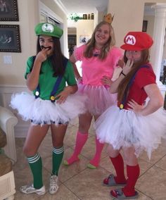 three girls dressed up as mario and luigi