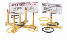 two wooden rings and ring toss set with instructions on the front, one is yellow