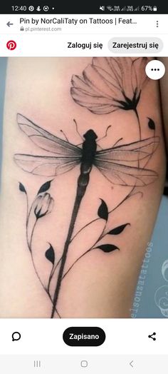 a black and white photo of a dragonfly on the side of a woman's thigh