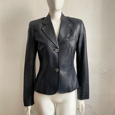 Gorgeous Coach Leather Fitted Jacket In Deep Blue Black Leather. Sleek, Fitted Leather Jacket With A Notched Collar, Seam Detailing And Pearlized Buttons. Fully Lined. Size: 4 Shoulder Seam To Shoulder Seam: 15” Pit To Pit: 17” Waist: 28” Length: 23” Condition: Excellent, Gently Worn. Designer Fitted Leather Jacket For Office, Classic Long Sleeve Leather Jacket For Evening, Designer Fitted Leather Jacket With Notch Lapel, Coach Fitted Outerwear For Work, Fitted Coach Outerwear For Work, Classic Leather Jacket For Night Out, Coach Jacket, Coach Leather, Workout Jacket