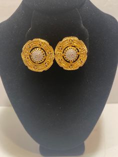 Vintage Signed Nettie Rosenstein Gold Colored with Marcasite (?) in the Middle Clip-On Earrings, 1-1/8" in diameter.  Buyer pays 6 dollars shipping and handling in US only.  Message me with questions. Antique Round Earrings For Evening, Formal Round Clip-on Earrings, Formal Round Hallmarked Plug Earrings, Clip-on Round Earrings For Anniversary, Ornate Round Earrings For Anniversary, Round Clip-on Earrings For Anniversary, Formal Round Clip-on Plug Earrings, Round Clip-on Costume Jewelry, Antique Round Clip-on Earrings For Anniversary