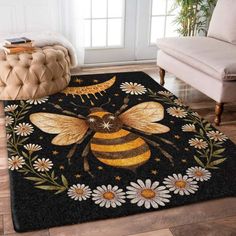 a rug with a bee and daisies on it