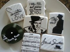 cookies decorated with elvis presley's song and handwritten notes are on a plate