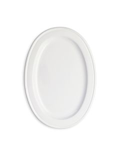 an empty white plate on a white background