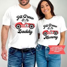 a man and woman wearing matching shirts with the words pit crew daddy and mommy on them