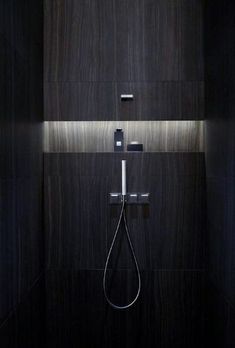 the shower head is illuminated by two lights