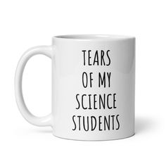 a white coffee mug with the words tears of my science students printed on it in black