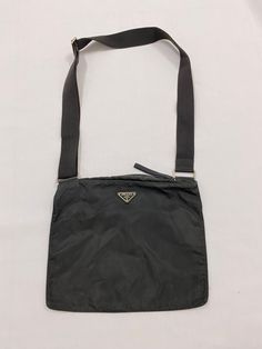 Authentic Vintage Prada Crossbody bag ❤️DETAILS❤️ 💥Colour: Black 💥Brand : prada 💥Material :Nylon 💥MADE IN ITALY 💥adjustable straps    💥CONDITION  : (Good vintage      Condition)    💳Payment method: Etsy payment ❌NO RETURN / NO SWAP .❌ ‼️OFFER ME YOUR BEST PRICE⁉️ ✈️Shipping Item will be ship in 3 working days after purchase. It will take 3-5 working days to reach at destination. We are using DHL Express with tracking number. 💰Offer If you make offer, be prepare that i will accept you offer, so please serious and make payment within 24hour. 🙏Please be serious with your offer!! i do accept offer BUT please be reasonable. Don't waste my time and your time with your offer not serious offer. I dont have time with it. Please be RESPONSIBLE. 😊Thank you very much for your visit and inter Designer Nylon Crossbody Shoulder Bag, Prada Vintage, Vintage Prada, I Dont Have Time, Bag Details, Wasting My Time, Prada Crossbody, Prada Crossbody Bag, Nylon Bag