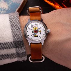 Rare model of vintage "Wostok" watch with Mickey Mouse on the dial  The watch has original box and documents. The watch was released in 1980s. The dial of the watch shows famous character from the "Mickey Mouse" cartoon. A real find for those who collects items with cartoon characters! In the 1970s, the cartoon culture was gaining momentum in the USSR, cartoon characters such as Mickey Mouse were increasingly popular in the USSR. These cartoon characters won the hearts of not only children, but Retro Analog-style Collectible Watch Accessories, Retro Automatic Collectible Watches, Retro Watch Accessories With Subdials, Mickey Mouse Retro, Watch Gift Box, Mouse Cartoon, Mickey Mouse Cartoon, Retro Watches, Watch Gifts