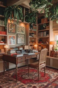 a home office with lots of books and plants hanging from the ceiling, along with a rug on the floor