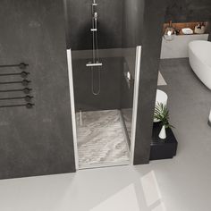 a bathroom with a walk in shower next to a bathtub and sink area on the floor