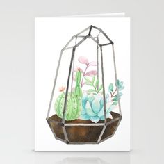 a card with a watercolor painting of succulents in a terrarium