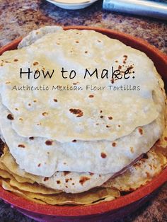 tortillas stacked on top of each other in a bowl