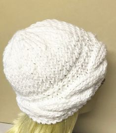 The white hat was knit with a thick white yarn. I added a pretty cable row. It will be nice and warm & stylish.  The slouchy hat is knit in blue & white stripes in a ribbed pattern.  The cream hat is knit with soft yarn & a furry pompom. One size fits most. Rose Ponytail, Soy Candles Labels, Hat Cream, Ladies Hats, Pretty Hats, Blue Shawl, Cable Hat, Ponytail Hat, Hat Knit