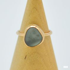 I find all my sea glass in the central coast of California. Chunky gray sea glass set in 14k yellow gold fill.  Gold-filled jewelry has 100x more gold alloy than gold plated and because that layer is so much thicker, it means gold-filled jewelry lasts longer and stands up to wear and tear better than gold plated. All it would take is one small scratch on a gold-plated piece to expose the jeweler's brass underneath. As long as the piece is well cared for, gold-filled jewelry can last a lifetime. Gold Alloys, Central Coast, San Luis Obispo, Gold Filled Jewelry, Glass Set, Stackable Rings, Last Minute Gifts, Sea Glass, Favorite Jewelry