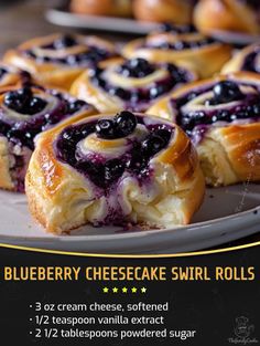 blueberry cheesecake swirl rolls on a white plate