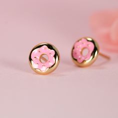 These donut earrings are a sweet treat for your ears. Made from solid sterling silver with a gold plated donut shape and your choice of strawberry frosting or chocolate frosting enamel colors, these funny donut stud earrings make a playful accessory for any occasion. Whether you're celebrating National Donut Day or just want to add a touch of whimsy to your look, these donut earrings will help you stand out from the crowd in stylish, delicious fashion. The donut shape and bright frosting colors Donut Frosting, Donut Humor, Donut Jewelry, Donut Earrings, Donut Day, Frosting Colors, Donuts Earrings, National Donut Day, Strawberry Frosting